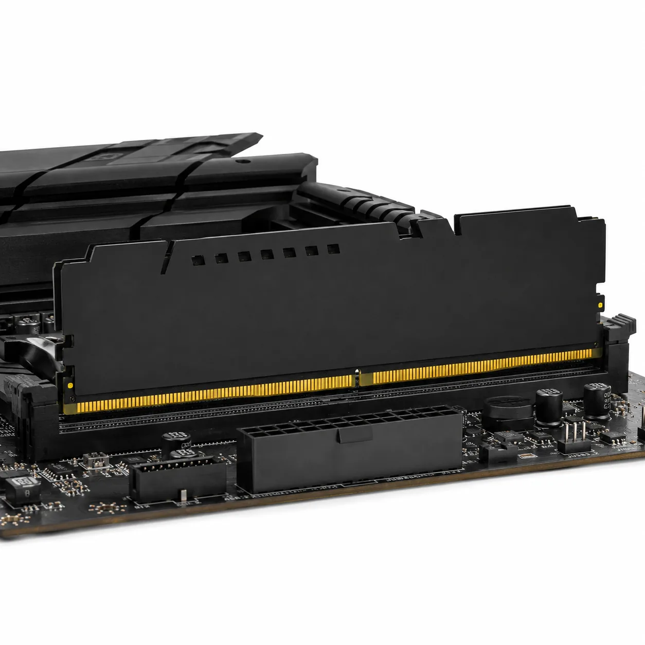 DDR5 RGB module installed upright in a DIMM slot on a motherboard